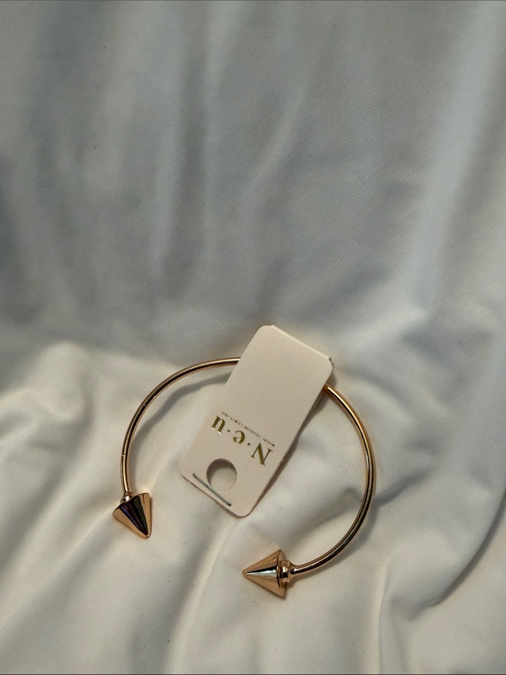 N•e•u arrow bangle Gold color Open Cuff Bracelet with Cone End Caps NWT